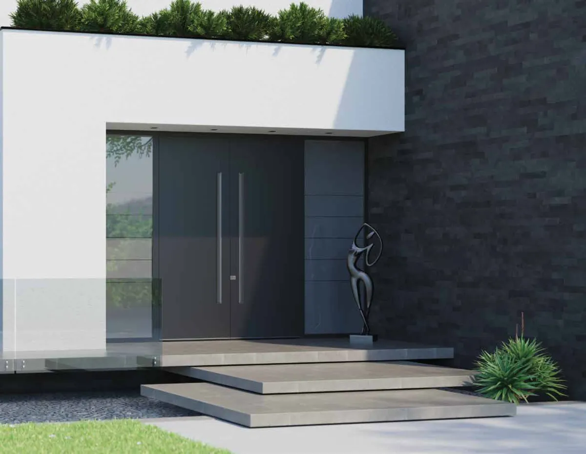 Pirnar Ultimum Haustür mit Skulptur und Naturstein in Neuweiler